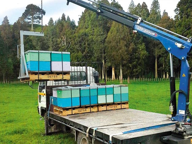 Quicklift-cranes-lifting-bee-hives.jpg