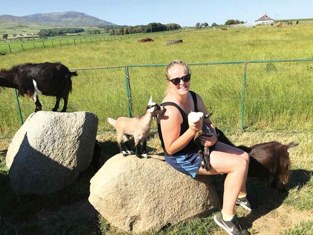 Sarah-Stark-feeds-baby-goats.jpg