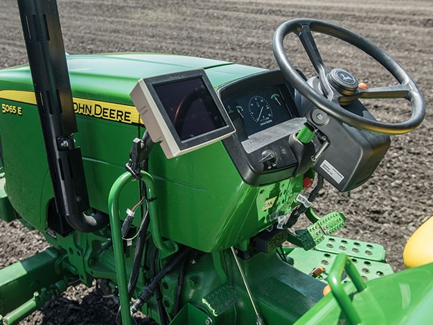 The 4240 Universal Display is an economical display for AutoTrac and documentation for open-station tractors