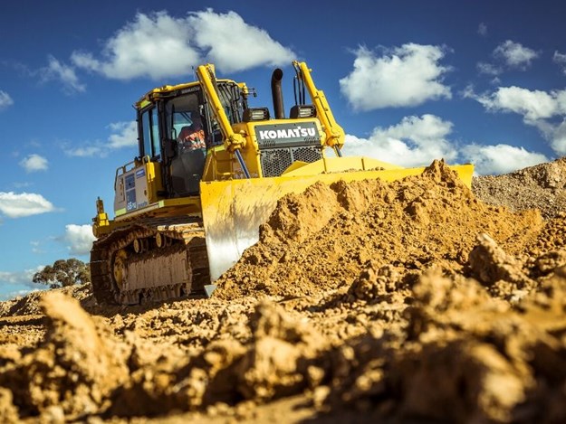 The Komatsu D65PXi-18 IMC intelligent dozer carving out the track
