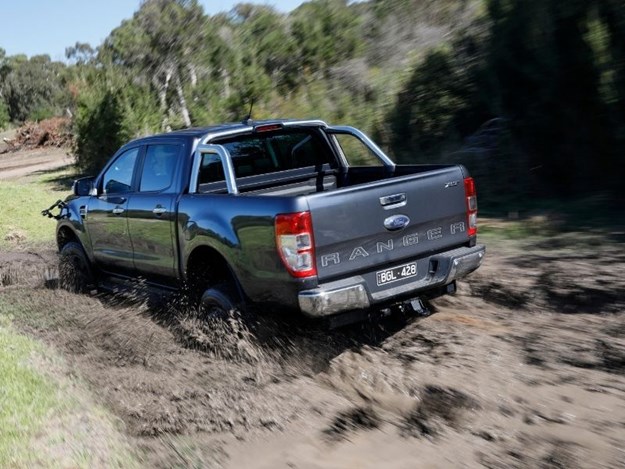 The Ford Ranger XLT going through the mud