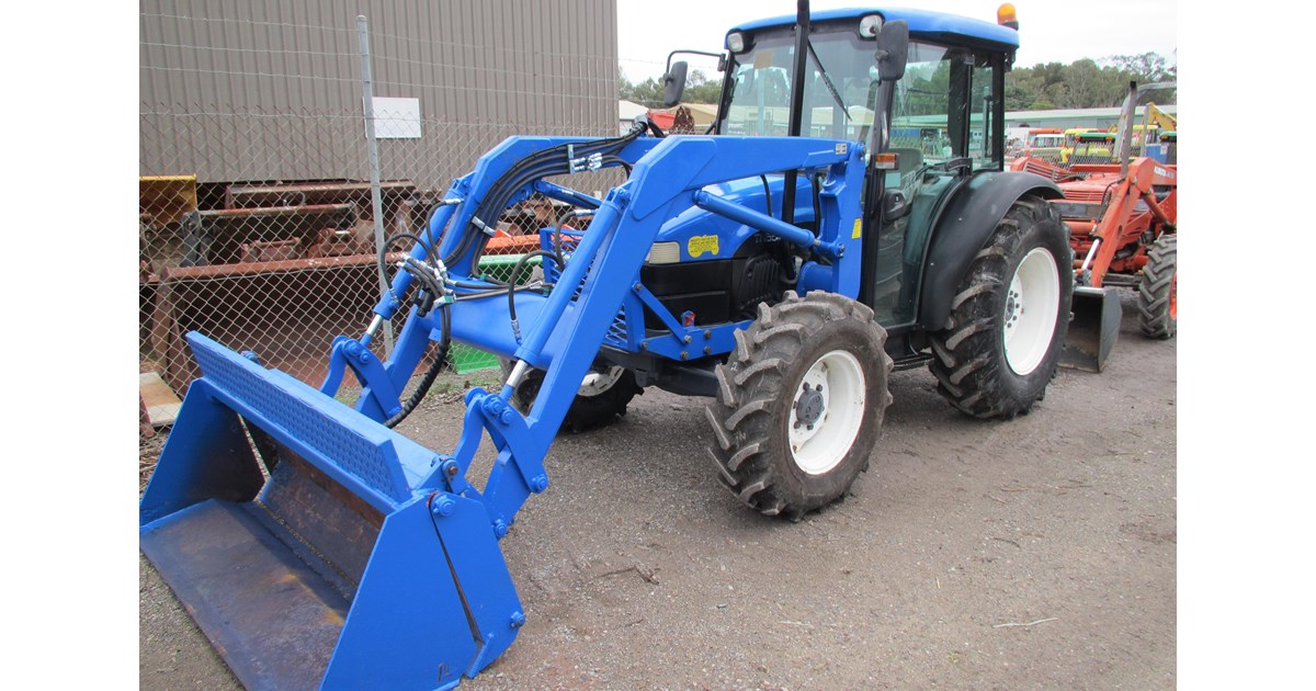NEW HOLLAND TN55D TRACTOR WITH BURDER FRONT END LOADER for sale