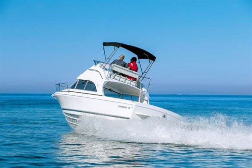 Caribbean 24 Flybridge turning on the water