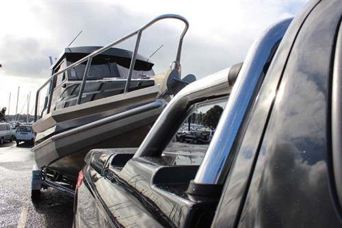 Mitsubishi Triton towing a boat