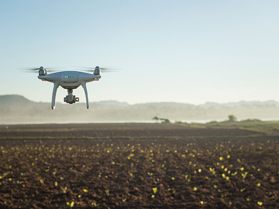 A drone surveying a field