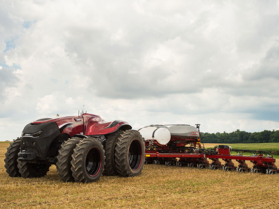 The Case IH ACV hooked up to a sprayer