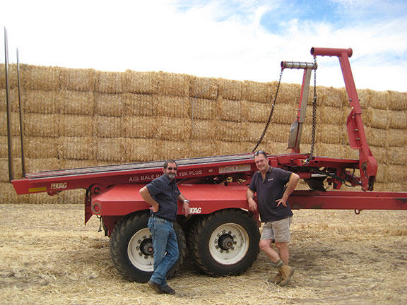 Geoff Perkins with SP Hay WA General Manager Rob Pauley and ProAG 16K plus