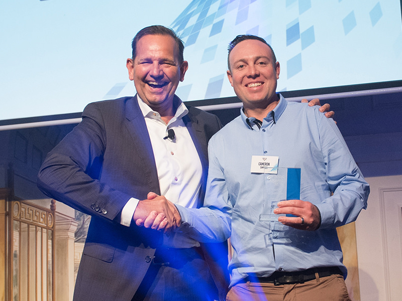  Winning grin: Volvo Group Australia (VGA) chief and strong advocate for drivers, Peter Voorhoeve (left) with off-road winner Cameron Simpson from Victoria
