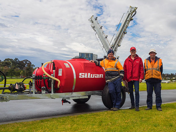 The Silvan sprayer with Victoria Racing club officials