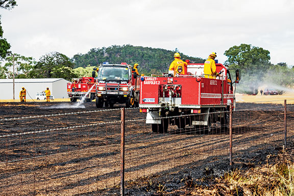 Victorian CFA members put out a grassfire in Langley