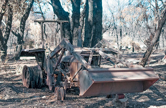 A burnt-out tractor after a fire in Margaret River
