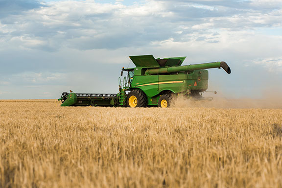 The John Deere S780 combine harvester in a field