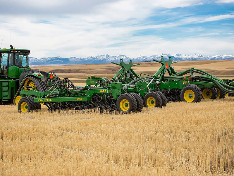 The John Deere 1895 aircart in a field of wheat