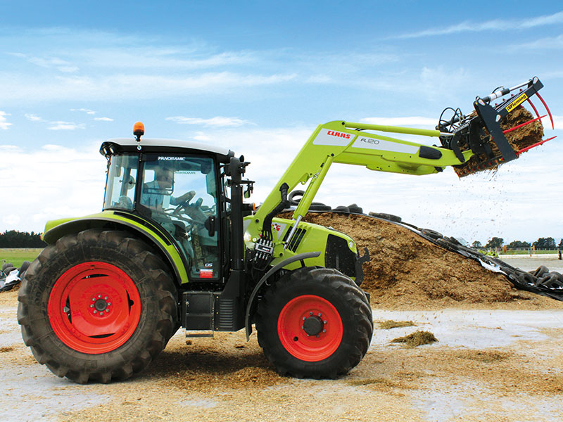 The New Claas Arion 460 with a front end loader attached