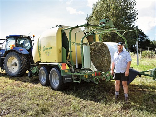 Wairarapa -dairy -farmer -Lewis -Herrick -with -the -Krone -Comprima -film -wrap -unit