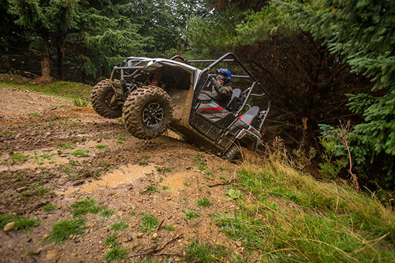 The Yamaha Wolverine X4 taking on a steep incline