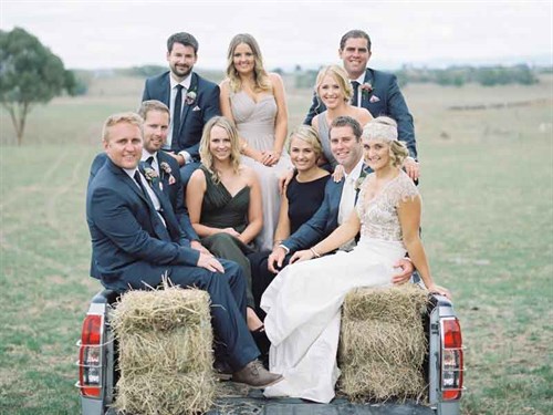 Mike -and -Ryley -at -right -with -their -wedding -party
